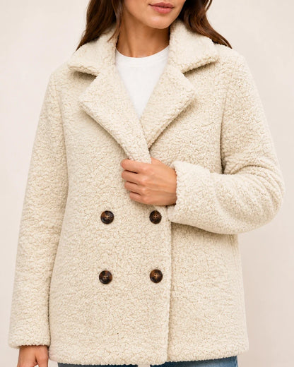 Cream White teddy coat, lapel button and texture detail.