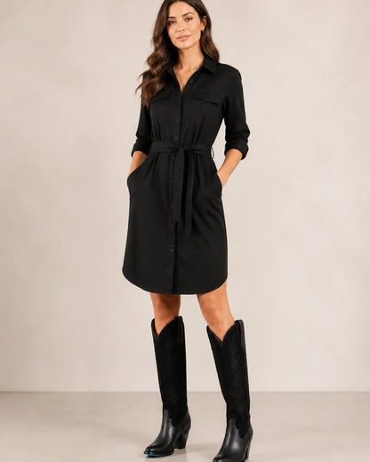 Jet-black leather and suede Western knee-high boots, silhouette view