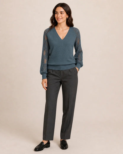 Women's Storm Blue ribbed V-neck sweater with floral lace sleeves, full styled silhouette.