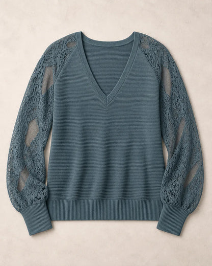 Women's Storm Blue ribbed V-neck sweater with floral lace sleeves, flat-lay view.