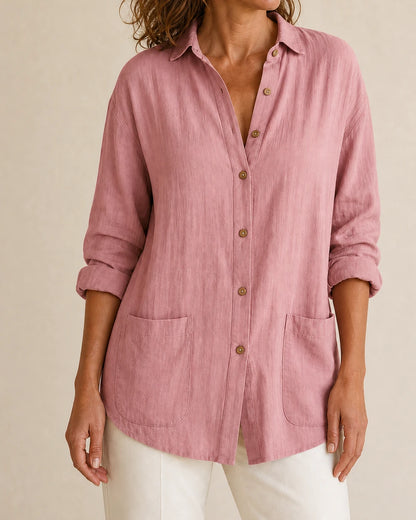 Women's pink relaxed longline shirt, front product view.
