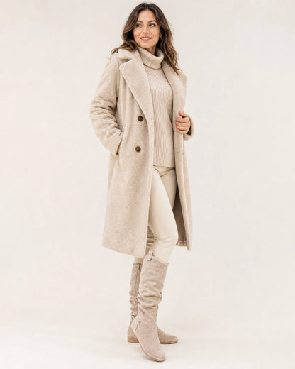 Women's beige slouch knee-high winter boots, hero view.